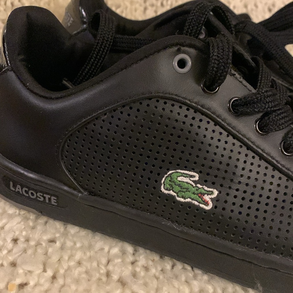 Women’s Lacoste black Carnaby sneakers, size 5.